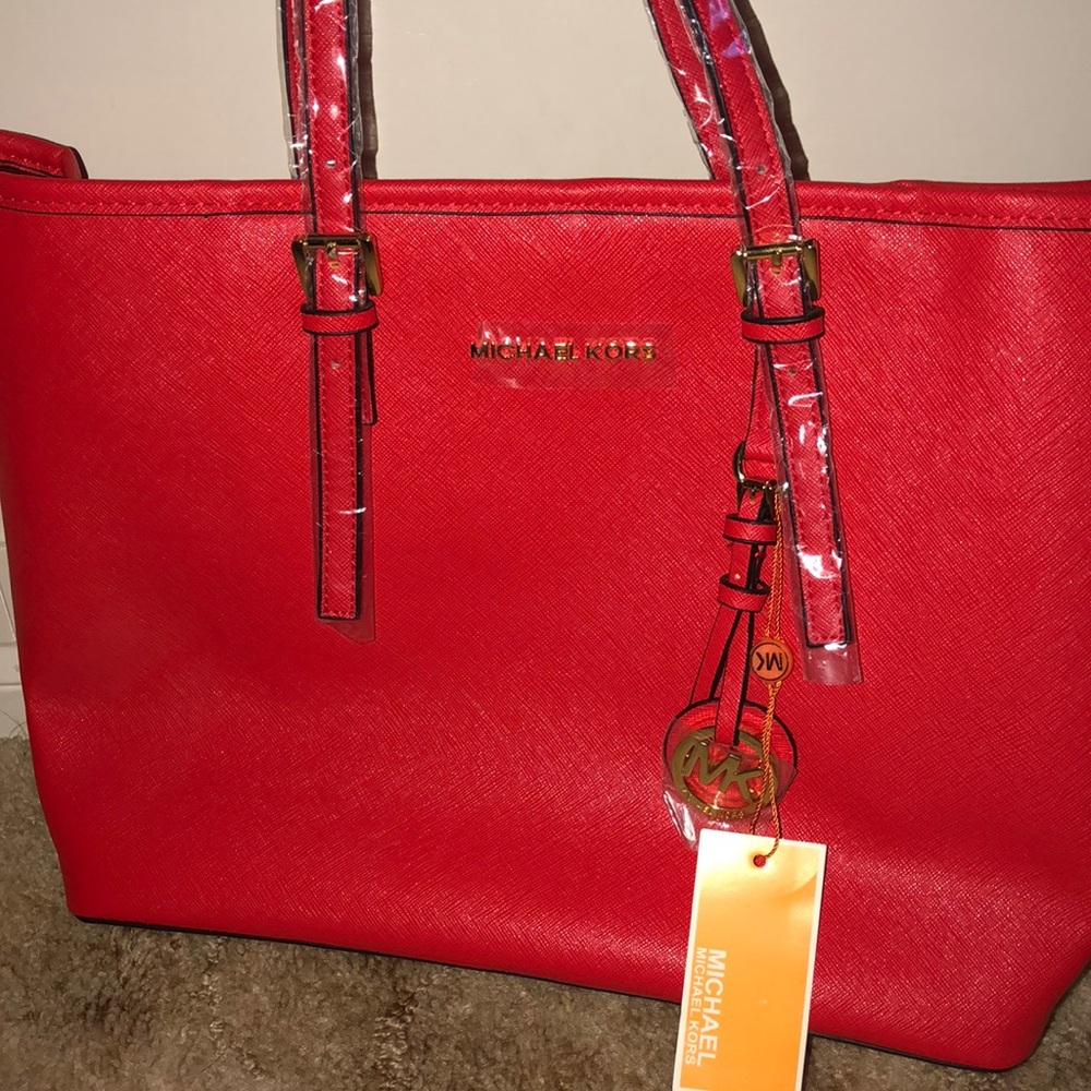 MICHAEL KOHRS RED BAG